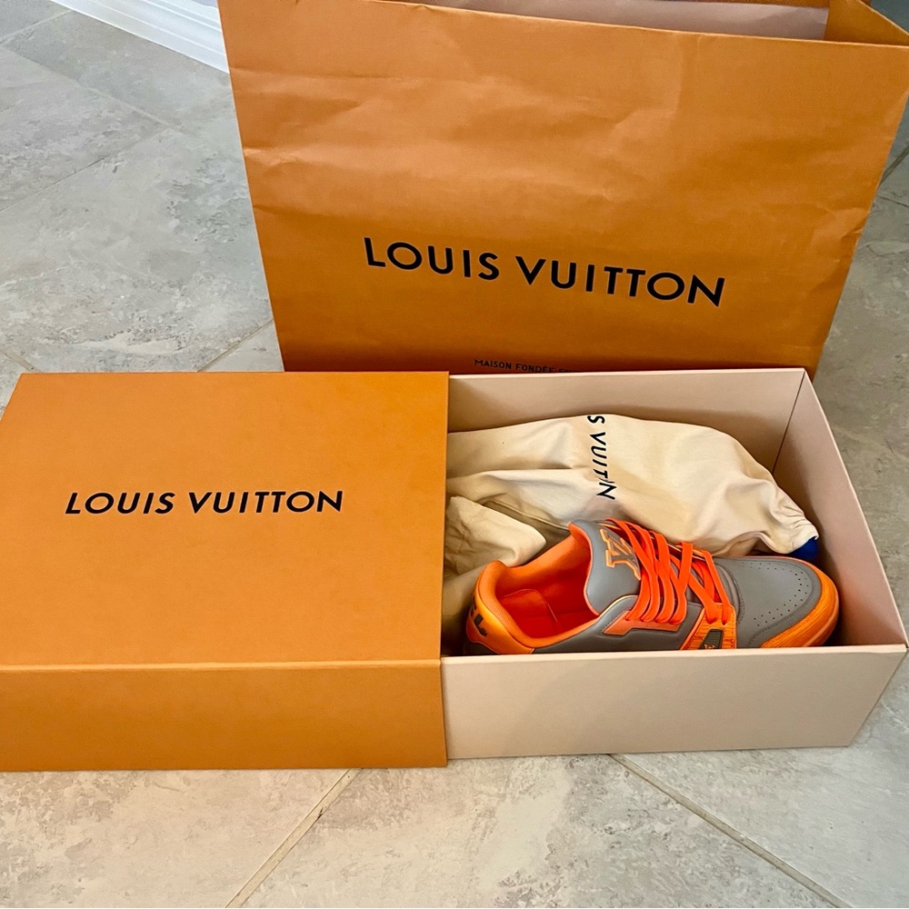 Louis Vuitton’s mens LV TRAINER AUTHENTIC ORANGE. SOLD OUT EVERYWHERE.